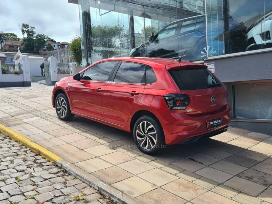 VOLKSWAGEN - POLO - 2022/2023 - Vermelha - R$ 104.000,00